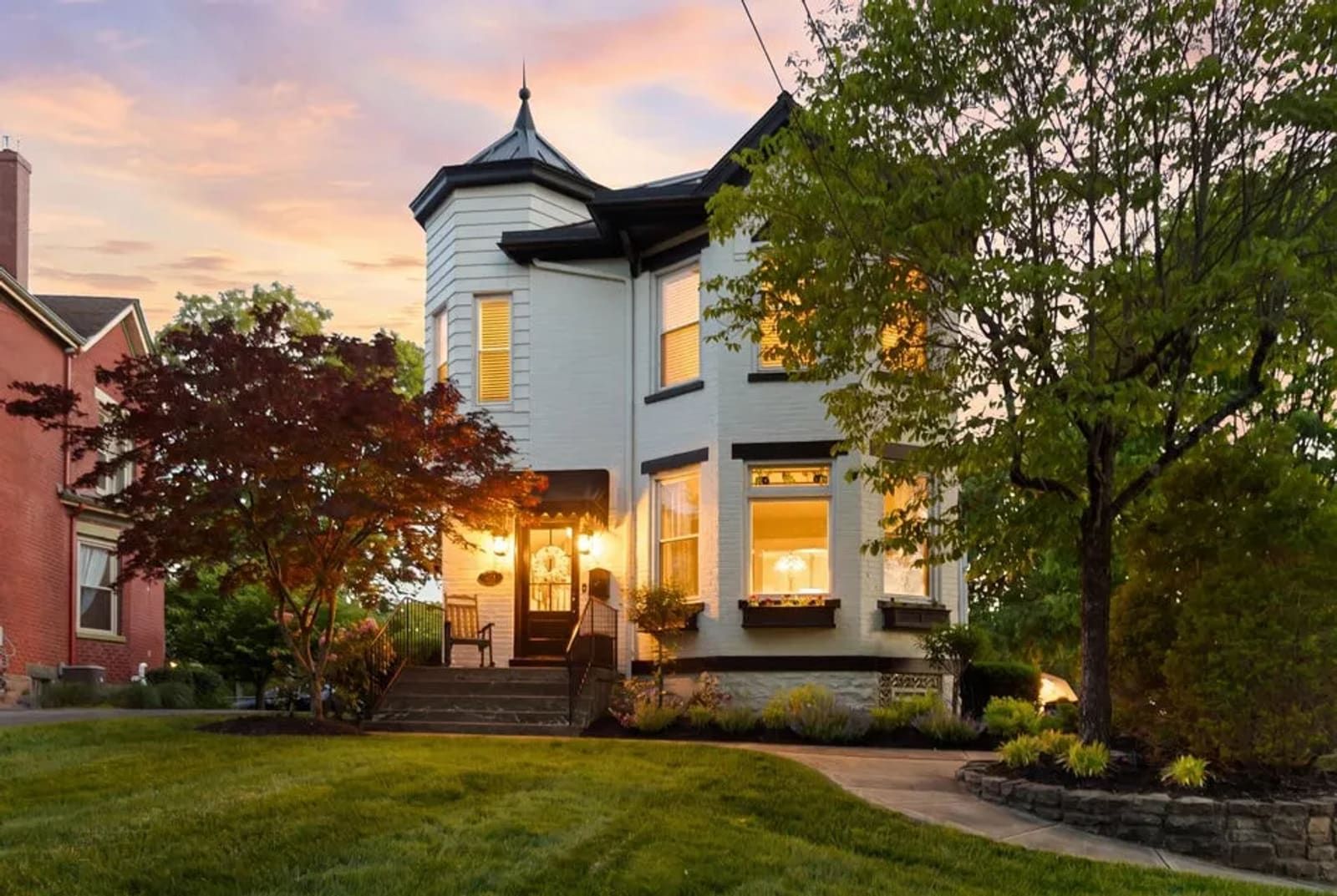 A Northern Kentucky home glowing warm at dusk