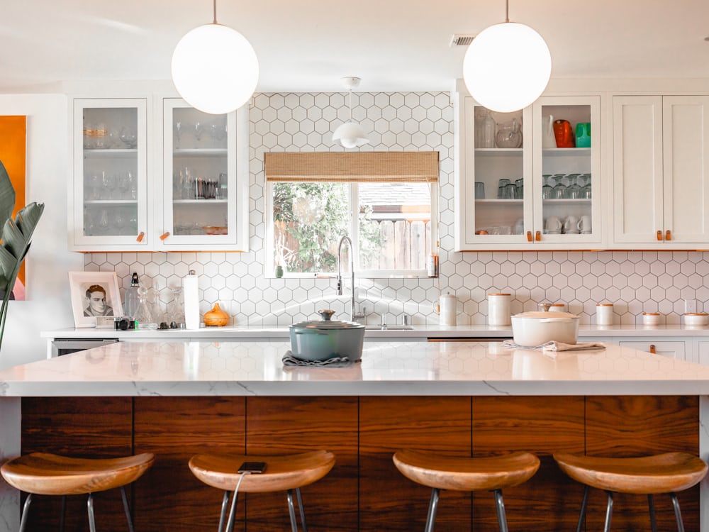 A bright, renovated kitchen with a large island